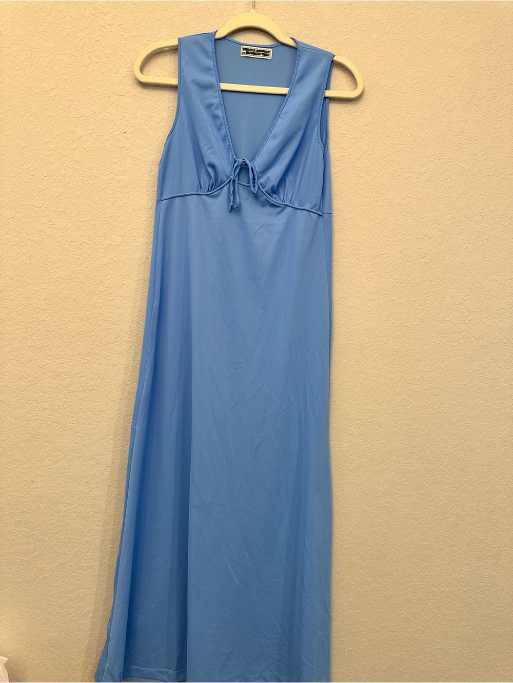 VINTAGE light blue lounge or sleepwear garment label from the Donald Brooks